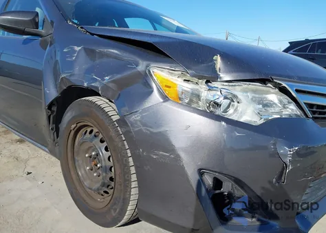 2014 Toyota Camry Le z USA, uszkodzony, nr VIN 4T4BF1FKXER377376